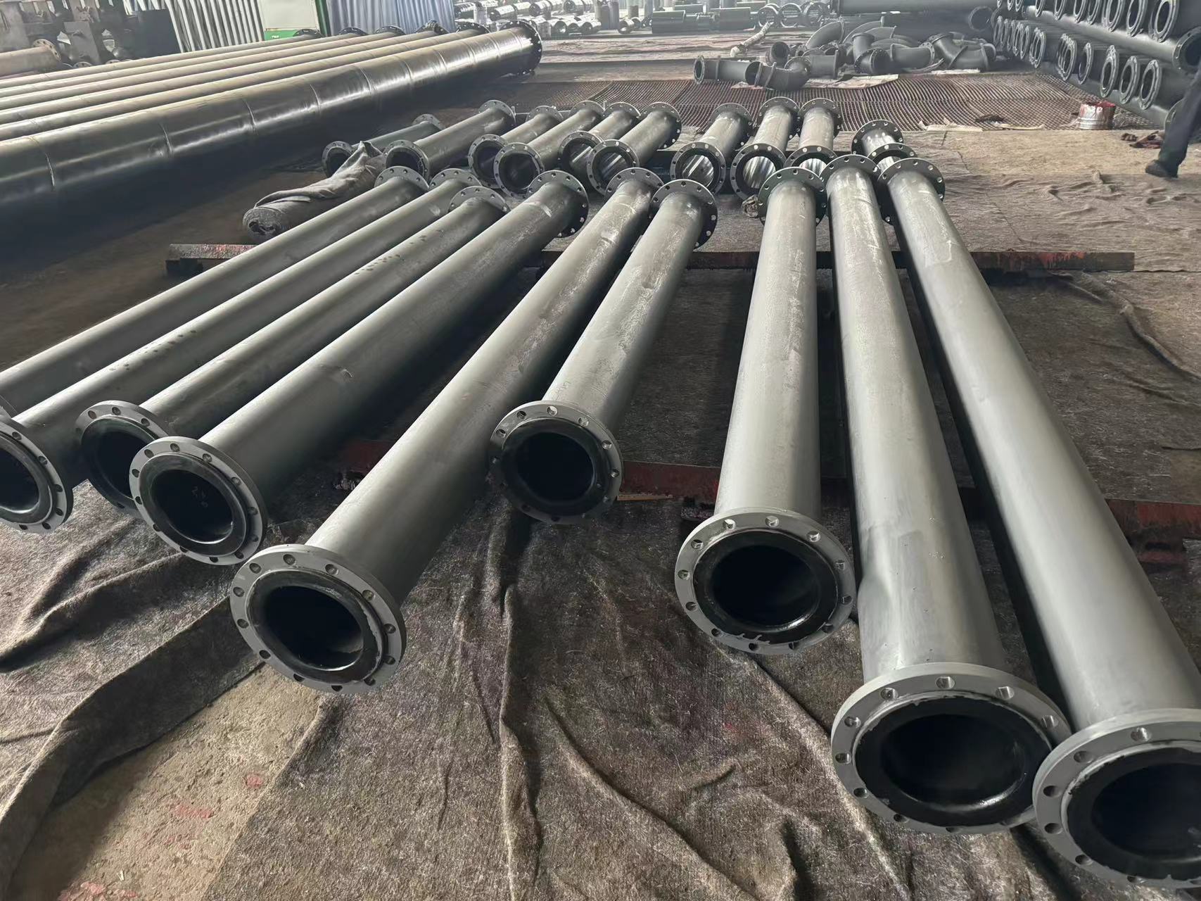 Steel pipe lined UHMWPE composite pipe awaiting de