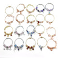 Women's Stainless Steel Coil Wire Wristband Adjustable Bracelet with Glass Beads and Cartoon Charms1