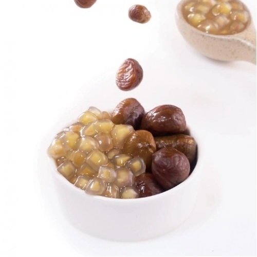 Perle di tapioca congelate a frutta: mango, castagne d'acqua e virgole avvolte da castagne