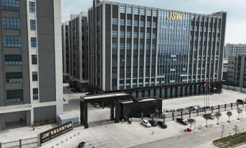Exterior view of Huizhou Jiansheng Rongye Company, showing increased investment in research and development.
