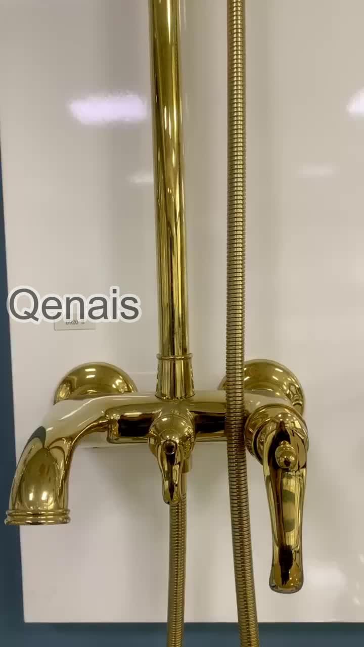 Conjunto de chuveiro de latão dourado exposto com bico e desviador