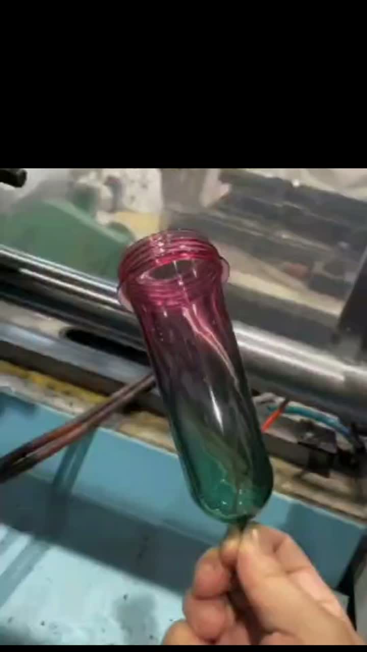 Injection molded plastic bottle