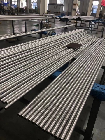 Machined titanium tube