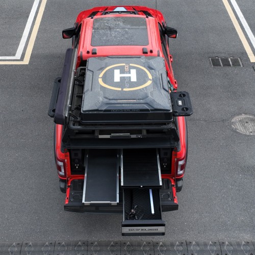 Может ли ваш ящик для кровати с пикапом превратиться в столик для кемпинга?