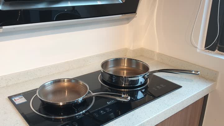 tri-ply cookware with nonstick coating