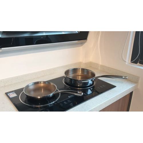 tri-ply cookware with nonstick coating