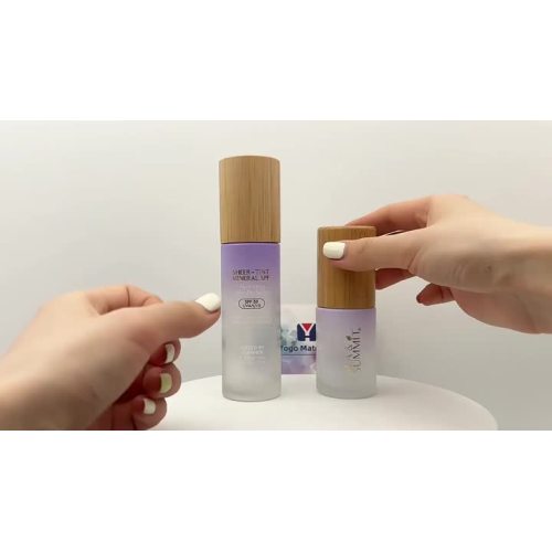 Bambuk qopqog'i bilan shisha toner shishasi