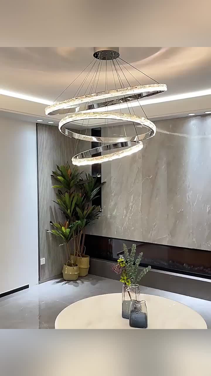 Chandelier en cristal rond moderne en acier inoxydable