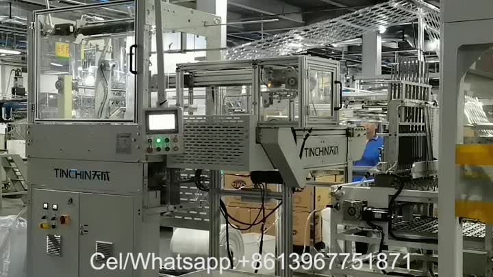 Contador automático de tapas y máquina envasadora.