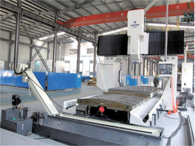 Gantry machining center with fixed beam