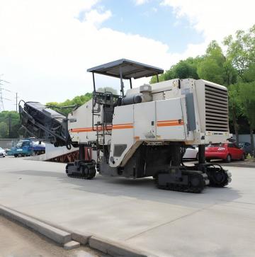 Cold milling machine - specialized equipment for municipal road renovation