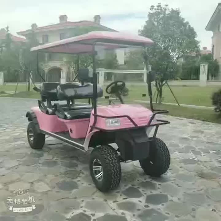 Four-seat pink electric cross-country golf cart.mp4