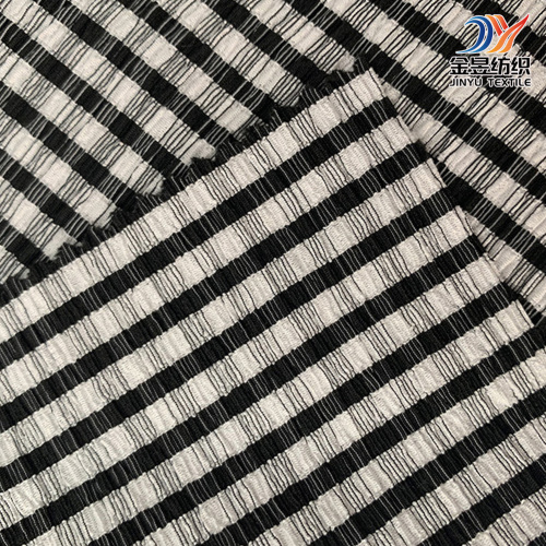 Jinyu Textile lanza un nuevo tejido de punto por urdimbre de poliéster elástico para los mercados industriales y de confección globales