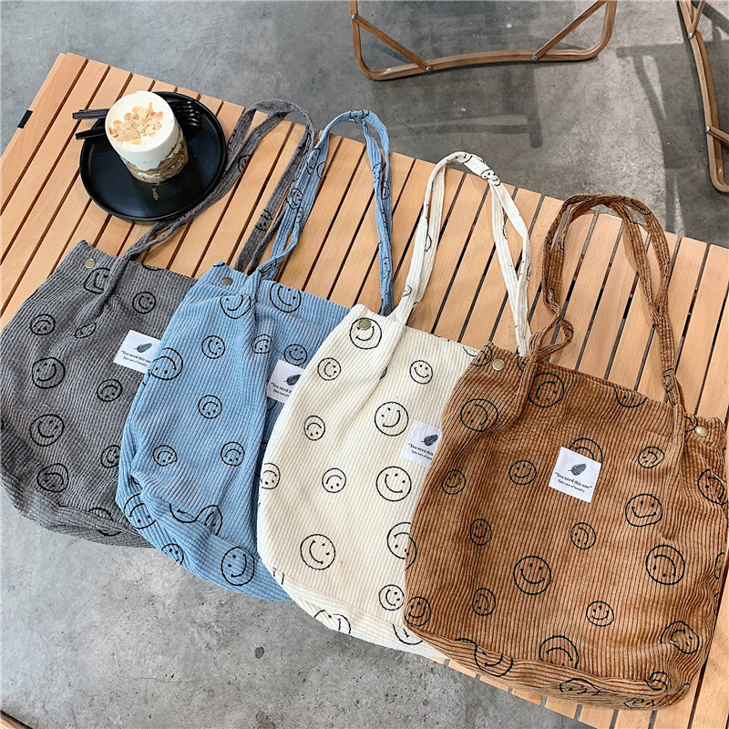 笑顔の顔コーデュロイバッグ