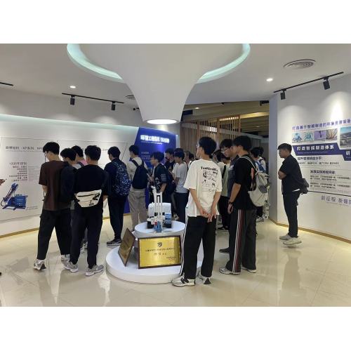 college students visited the company to study