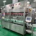 Automatic 4-Nozzle Oil Bottle Filling and Load Cell Weighing Machine1