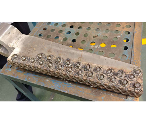 电厂关键部件耐磨增强：双核耐磨技术大幅延长给料板使用寿命