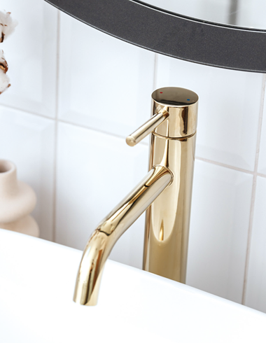 Stylish bathroom soap dispenser in upscale restaurant restroom