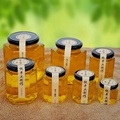 Manufacturers Wholesale Hexagonal Glass Bottles Honey Bottle Pickles Glass Jam Jar1