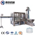 Full Automatic Mineral Water Filling and Packing Machine for 500ml Bottles1