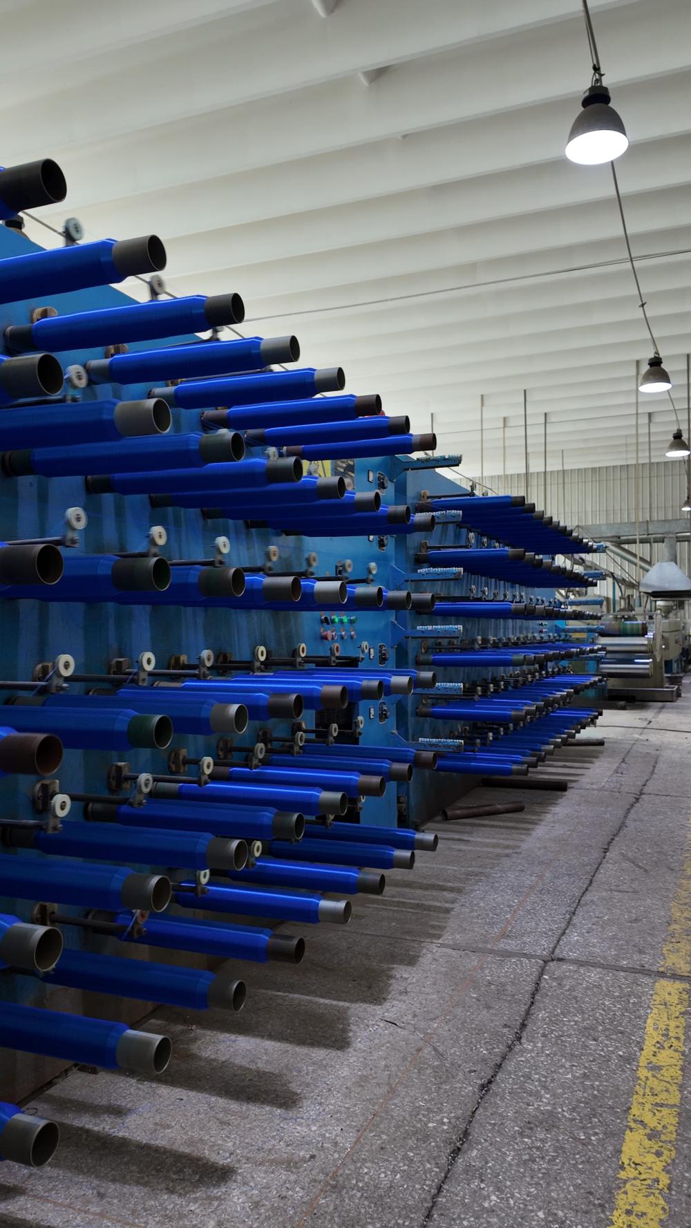 Wire drawing and winding machine
