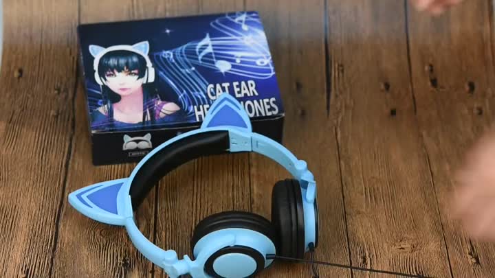 blue cat ear glowing headset for young people .mp4