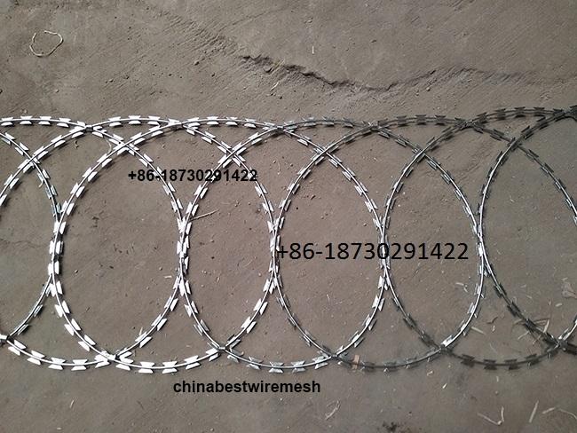 450mm coil diameter Razor wire flat wrap coils as a clapped into a flat panel formation.