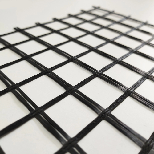 Glass and carbon geogrid reinforcement of asphalt mixtures