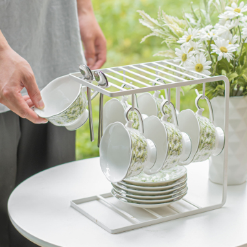 the Enchanting Mary Style Green Coffee Cup and Sau