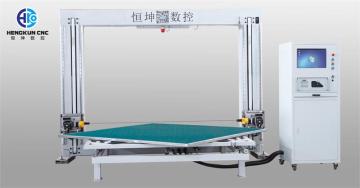 Oscillating blade foam cutting machine with turntable