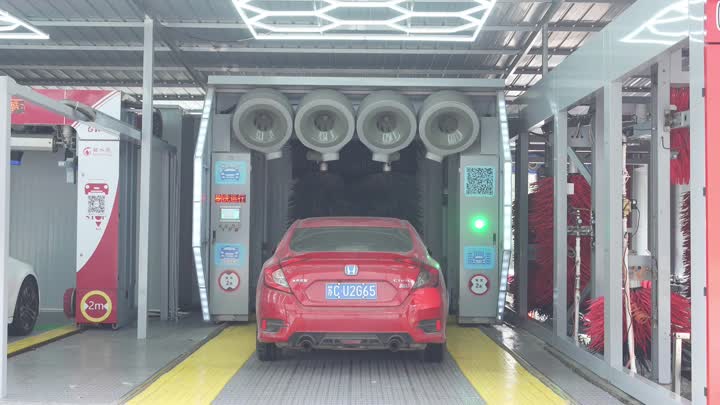 Reciprocating car washing machine