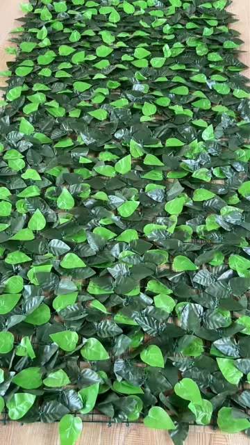 Display the simulated green plant splicing base plate mixed with peach leaves
