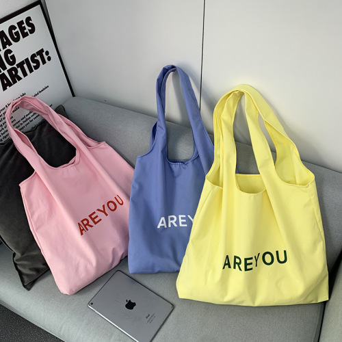 都市表現の再定義: AREYOU Vibrant Identity シリーズ シームレス キャンバス バッグのご紹介