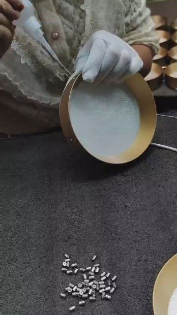 A beautiful woman is installing a lamp