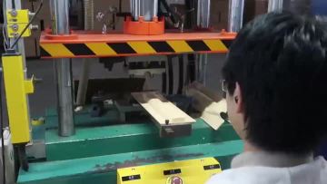 The trimming machine is punching