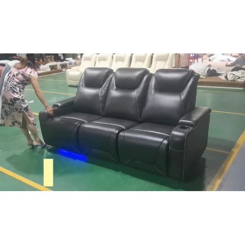 sofá de home theater com mesa de bandeja escondida