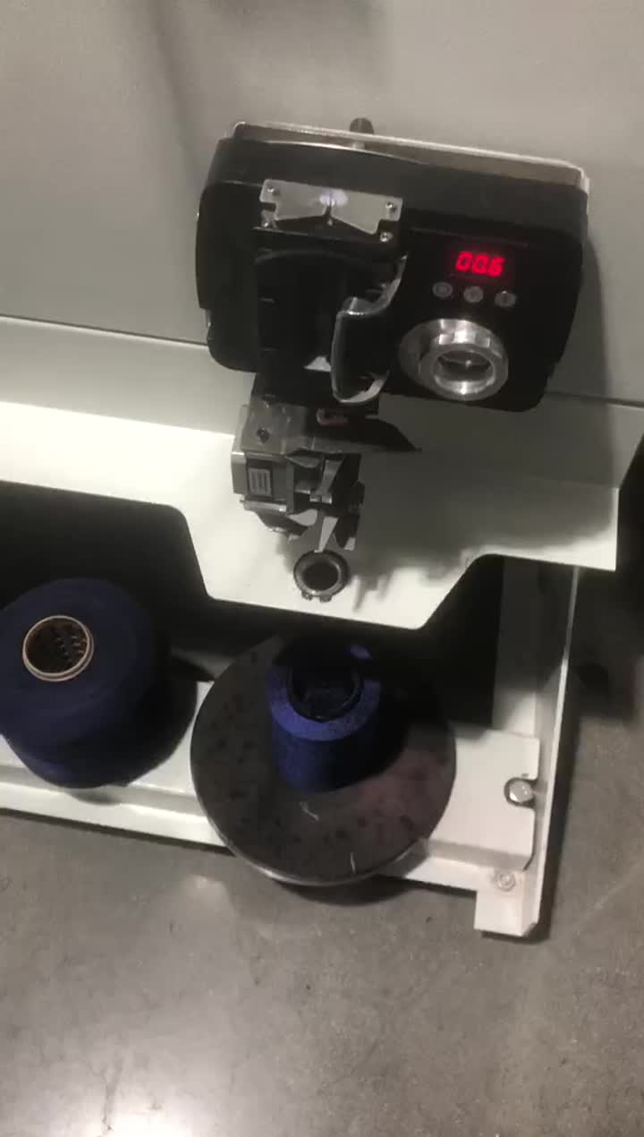 AUTOMATIC SEWING THREAD WINDING MACHINE