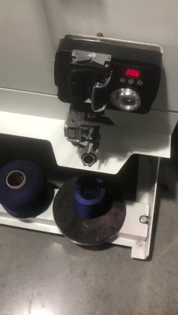 AUTOMATIC SEWING THREAD WINDING MACHINE