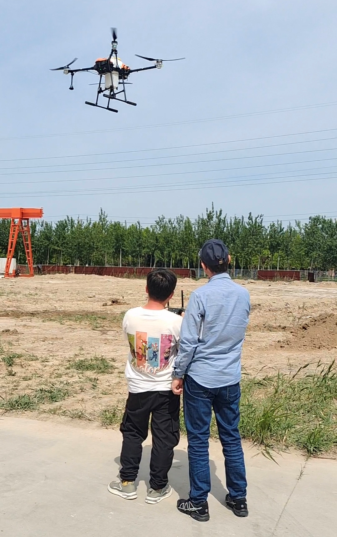 Training German customer to use agricultural drone