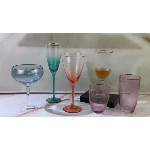 ribbed champagne glass set with gold rim