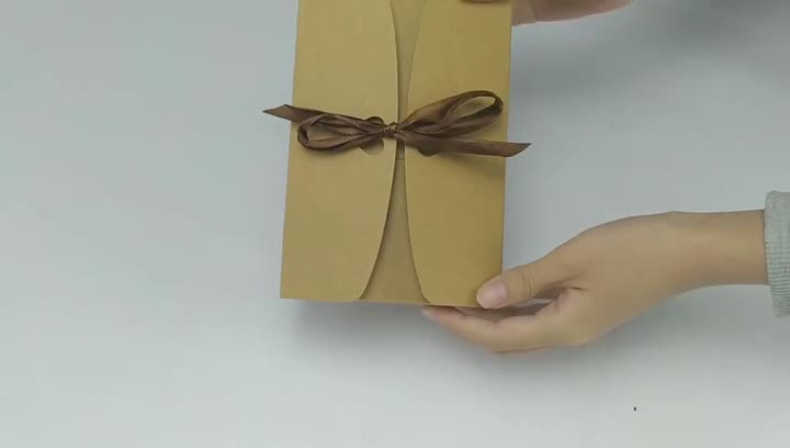 One piece folding mailer box with ribbon handle.mp4