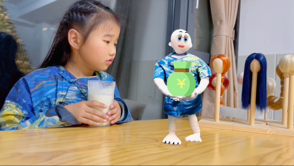 Familie doll asks Master to drink the yoghourt