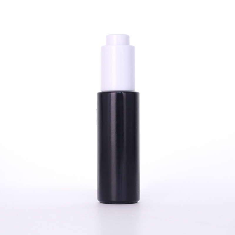 Botella de vidrio negro con bomba de cuentagotas de prensa blanca