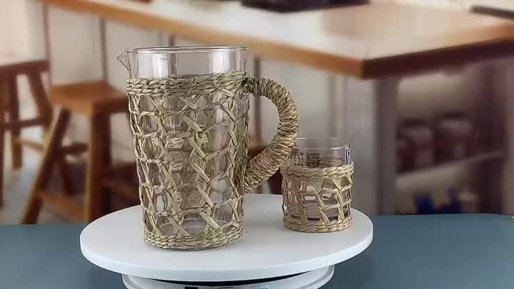 rattan wrapped glass water pitcher with cups