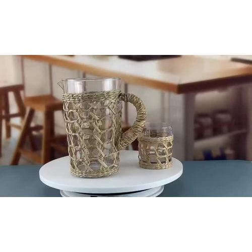rattan wrapped glass water pitcher with cups