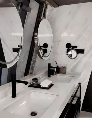 Luxury hotel bathroom with rain shower system