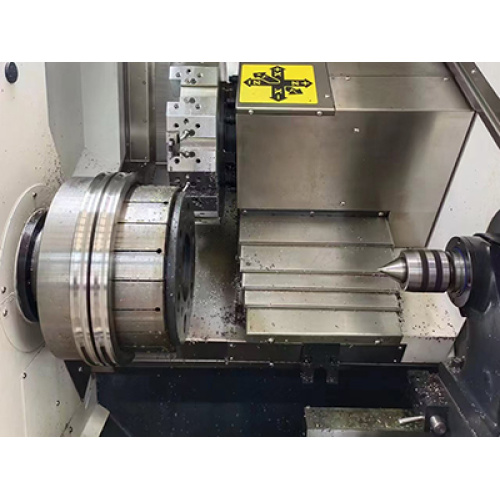 How does the CNC roller lathe improve the rolling efficiency of tungsten carbide composite rollers?