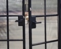 Customized European Standard Iron Doors with Glazed Windows and Top Hardware1