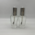 High Quality 30ml Clear Glass Eye Cream Bottle with Silver Eye Massager Tool for Skin Care Packaging1