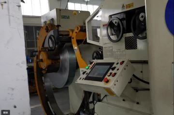 Continuous die stamping processing